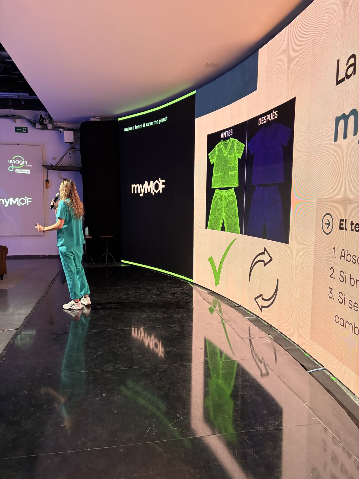 Teammate pitching myMOF on stage at the ImaginPlanet Challenge